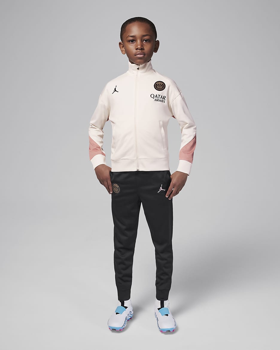 Paris Saint Germain Strike Third Younger Kids Jordan Dri FIT Football Knit Tracksuit. Nike LU